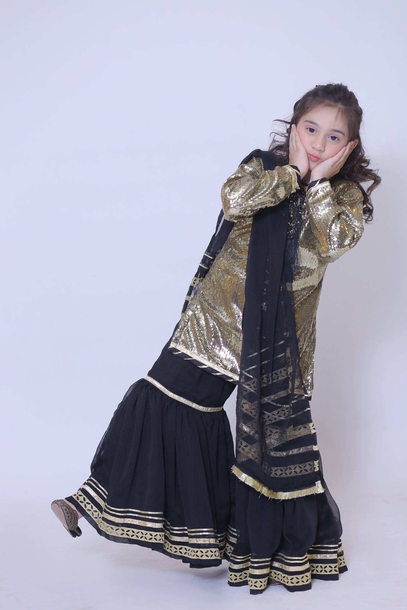 3 piece Golden Black Moonlight Chiffon Gharara Suit with Black net dupatta & Laces.(Stitch)