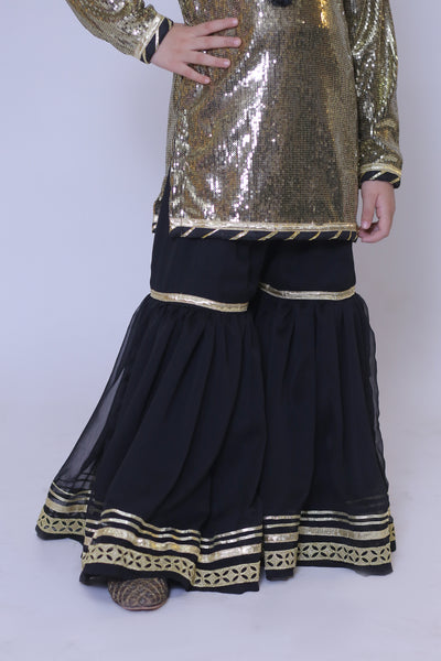 3 piece Golden Black Moonlight Chiffon Gharara Suit with Black net dupatta & Laces.(Stitch)