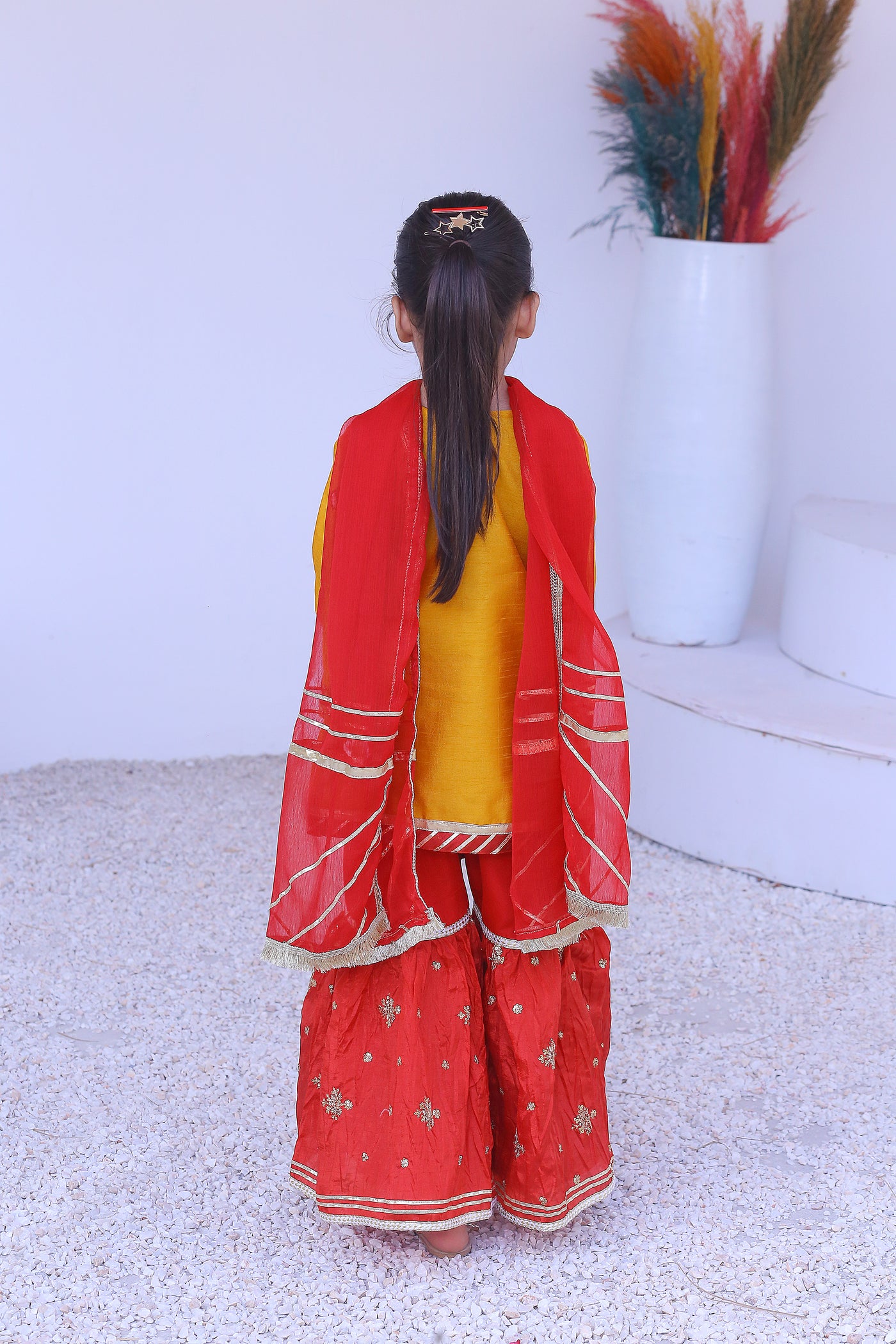 3 piece Mustered Raw Silk Gharara Suit with Reddish Maroon Crush Embroidery Gharara & Reddish Maroon Chiffon Dupatta.(Stitch)