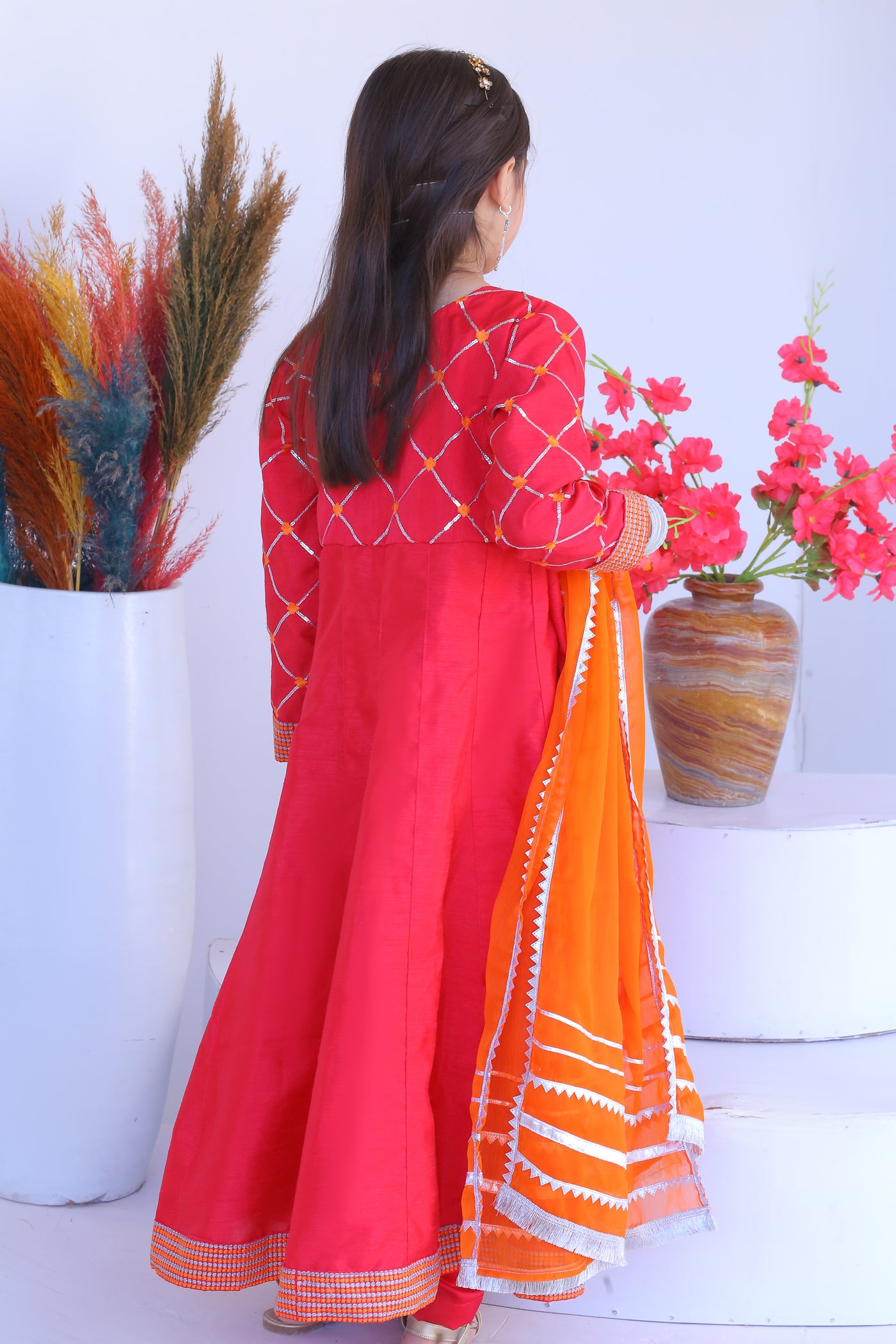 3 piece Shocking Pink Raw Silk Frock Suit with Dull Silk Trouser & Orange Chiffon Dupatta & Silver Laces.(Stitch)