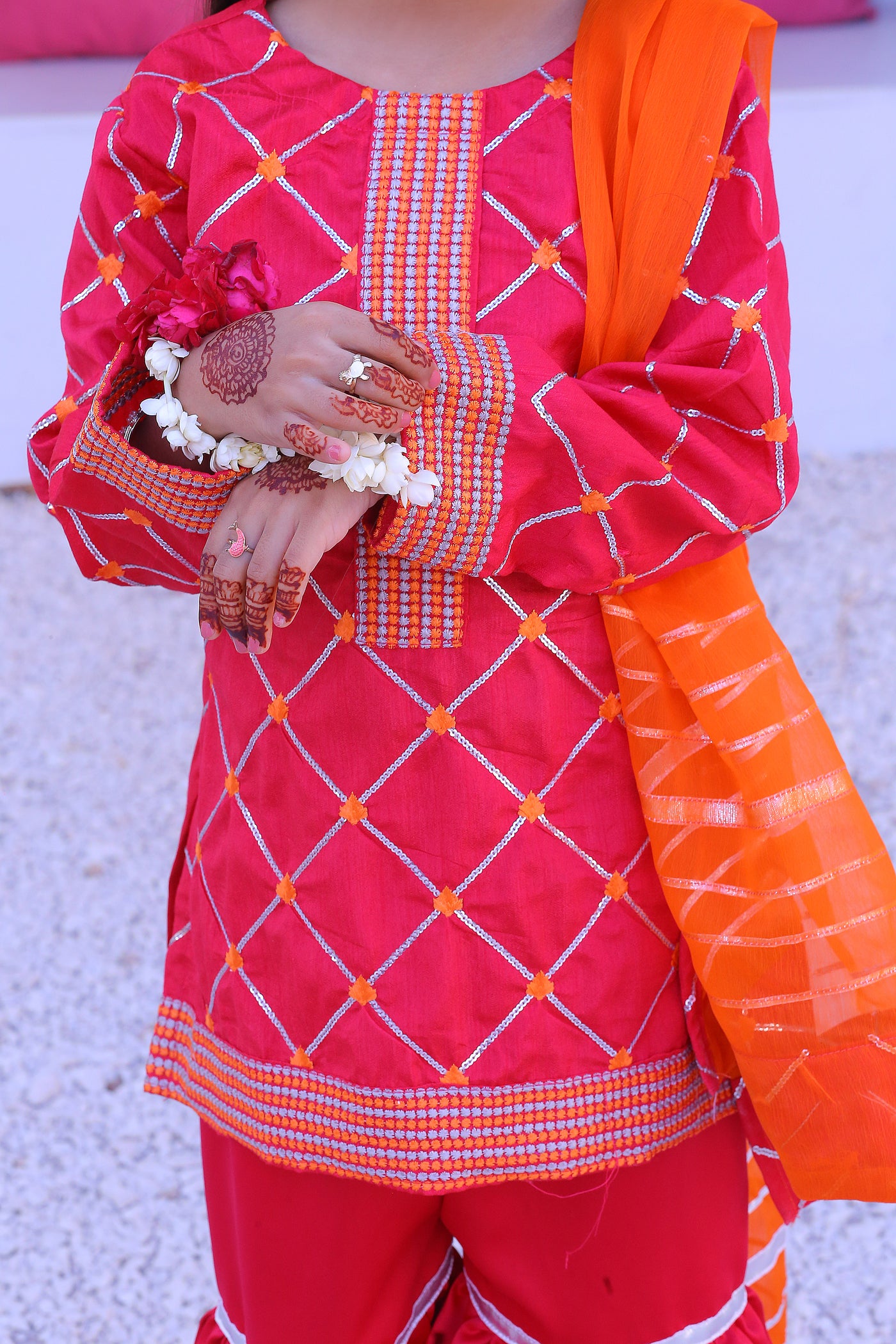 3 piece Shocking Pink Raw Silk Gharara Suit with Orange Chiffon Dupatta.(Stitch)