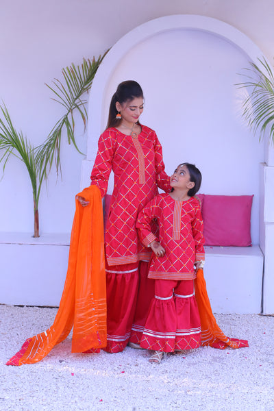 3 piece Shocking Pink Raw Silk Gharara Suit with Orange Chiffon Dupatta.(Stitch)