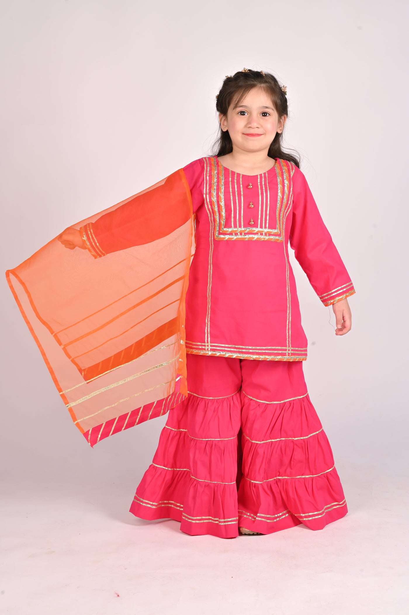 3 piece Shocking Pink Cotton Gharara Suit with Orange net Dupatta & Laces.(Stitch)