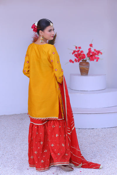 3 piece Mustered Raw Silk Gharara Suit with Reddish Maroon Crush Embroidery Gharara & Reddish Maroon Chiffon Dupatta.(Stitch)