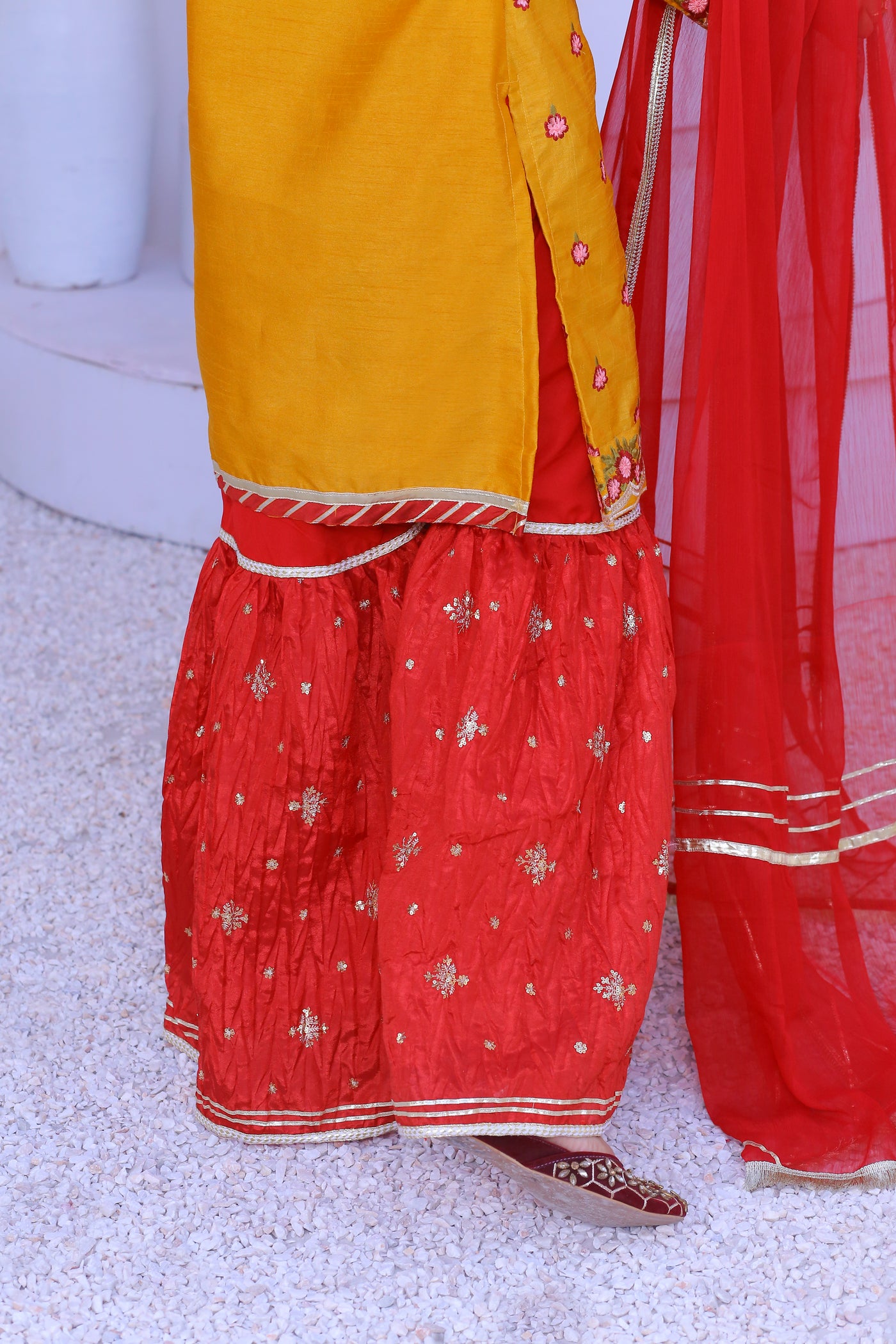 3 piece Mustered Raw Silk Gharara Suit with Reddish Maroon Crush Embroidery Gharara & Reddish Maroon Chiffon Dupatta.(Stitch)