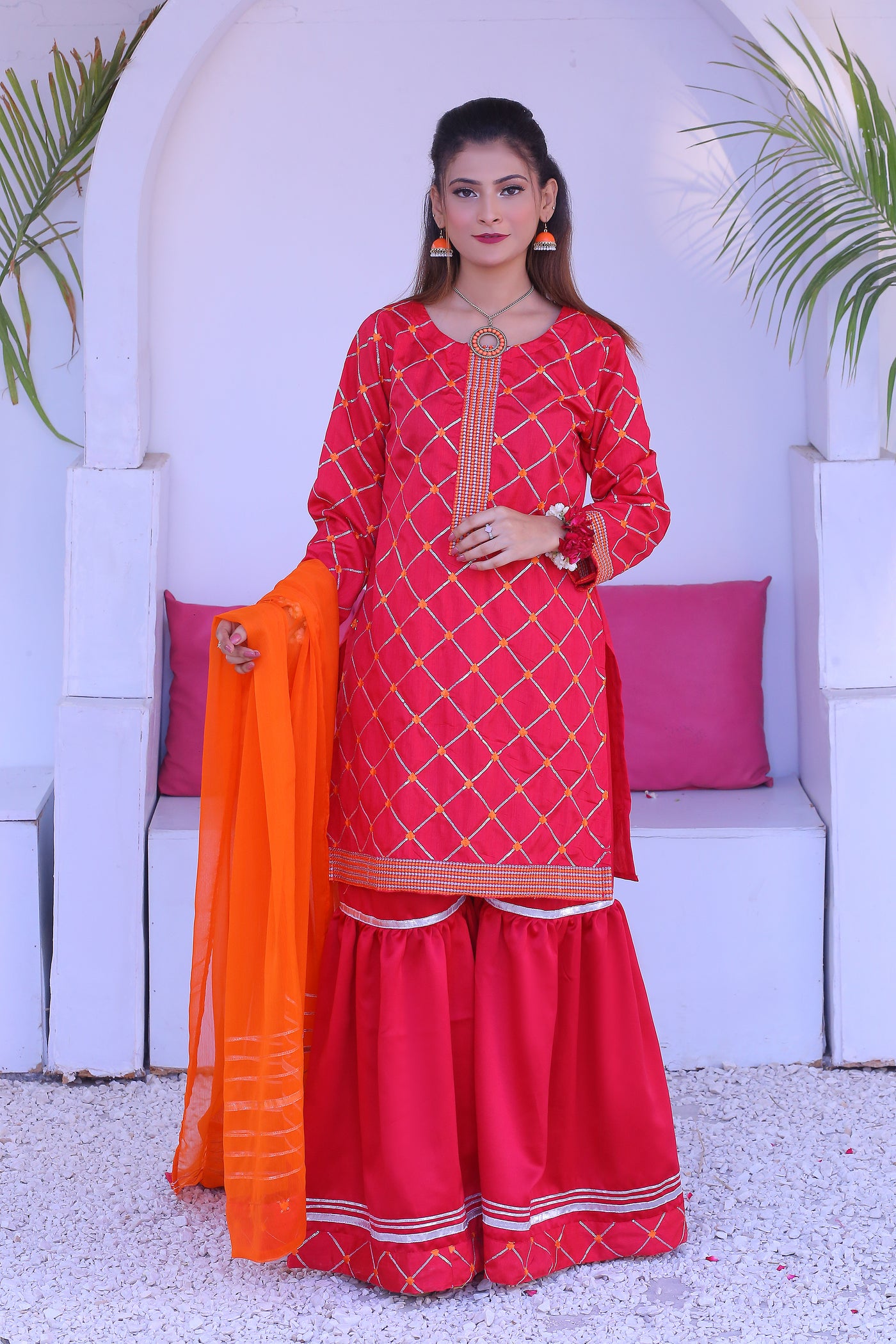 3 piece Shocking Pink Raw Silk Gharara Suit with Orange Chiffon Dupatta.(Stitch)